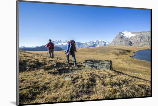 Hikers Wallking Along Rosset Lake, Gran Paradiso National Park, Alpi Graie (Graian Alps), Italy-Roberto Moiola-Mounted Photographic Print