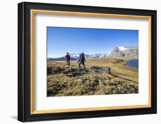 Hikers Wallking Along Rosset Lake, Gran Paradiso National Park, Alpi Graie (Graian Alps), Italy-Roberto Moiola-Framed Photographic Print