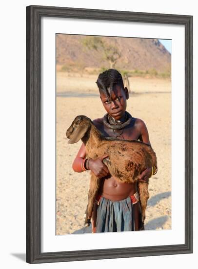 Himba Girl With Traditional Double Plait Hairstyle, Carrying A Goat-Eric Baccega-Framed Photographic Print