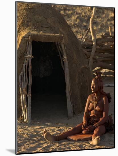 Himba Woman Grinding Rock into Powder, Purros Village, Kaokoland, Namibia-Kim Walker-Mounted Photographic Print