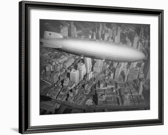 Hindenburg Flying over Manhattan-null-Framed Photographic Print