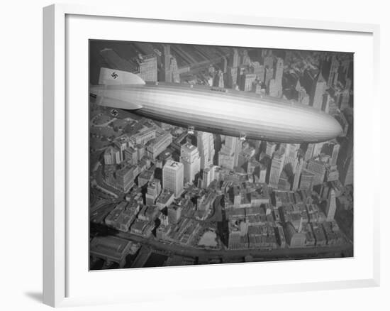 Hindenburg Flying over Manhattan-null-Framed Photographic Print