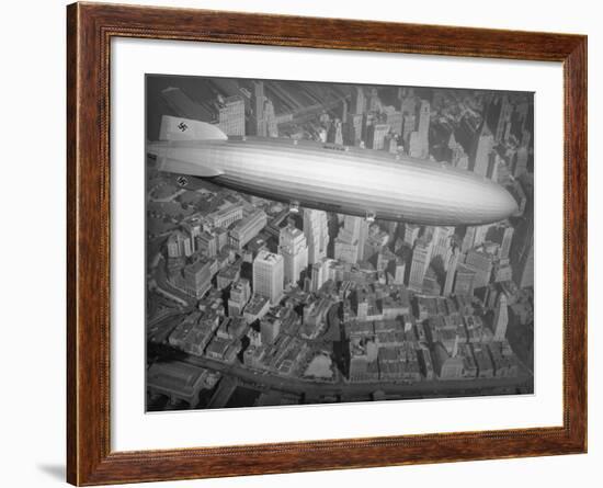 Hindenburg Flying over Manhattan-null-Framed Photographic Print