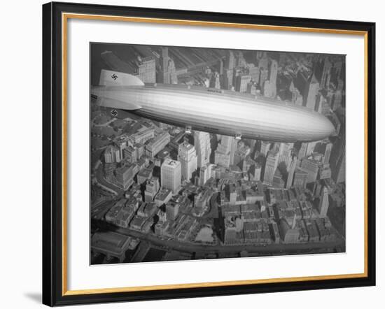 Hindenburg Flying over Manhattan-null-Framed Photographic Print