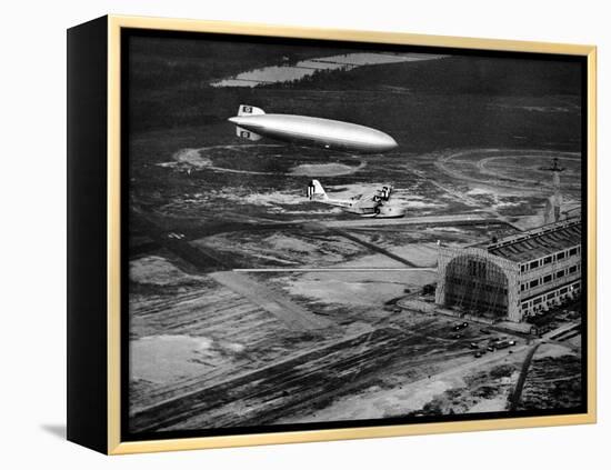 Hindenburg's Arrival with an Escort Plane over Lakehurst, New Jersey-null-Framed Stretched Canvas