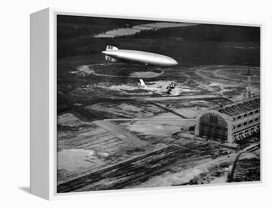 Hindenburg's Arrival with an Escort Plane over Lakehurst, New Jersey-null-Framed Stretched Canvas