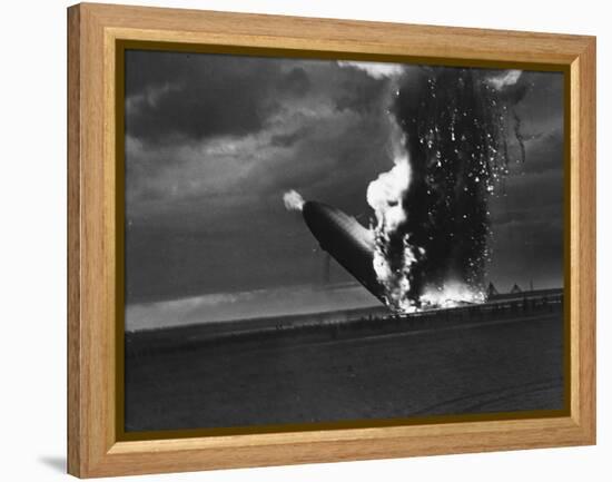 Hindenburg Zeppelin Bursting into Flames While Attempting to Land after 37th Ocean Crossing-Arthur Cofod-Framed Premier Image Canvas