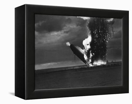 Hindenburg Zeppelin Bursting into Flames While Attempting to Land after 37th Ocean Crossing-Arthur Cofod-Framed Premier Image Canvas