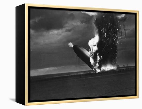 Hindenburg Zeppelin Bursting into Flames While Attempting to Land after 37th Ocean Crossing-Arthur Cofod-Framed Premier Image Canvas