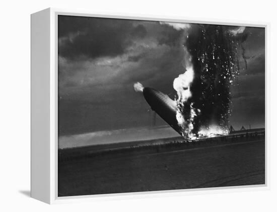 Hindenburg Zeppelin Bursting into Flames While Attempting to Land after 37th Ocean Crossing-Arthur Cofod-Framed Premier Image Canvas