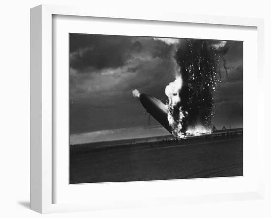 Hindenburg Zeppelin Bursting into Flames While Attempting to Land after 37th Ocean Crossing-Arthur Cofod-Framed Photographic Print