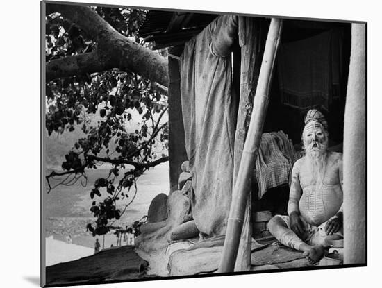 Hindu Holy Man Sitting in His Home-James Burke-Mounted Photographic Print