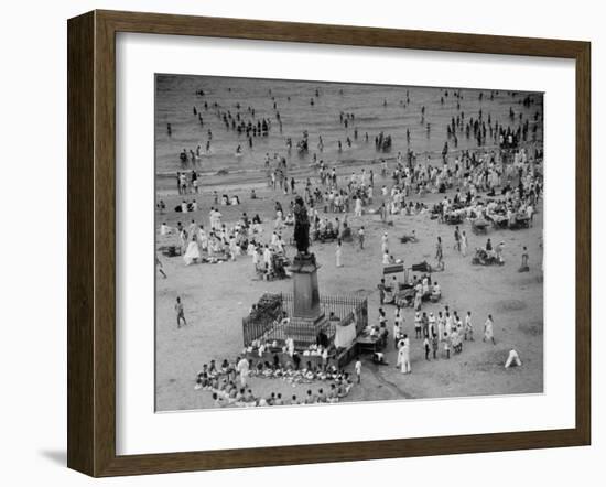 Hindu Men and Women Bathing in the Jumna River-Margaret Bourke-White-Framed Photographic Print