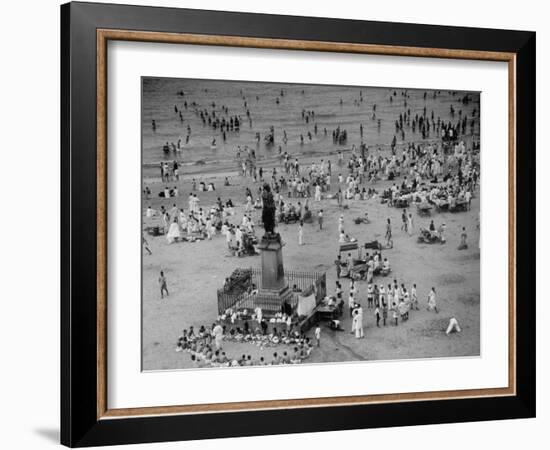 Hindu Men and Women Bathing in the Jumna River-Margaret Bourke-White-Framed Photographic Print