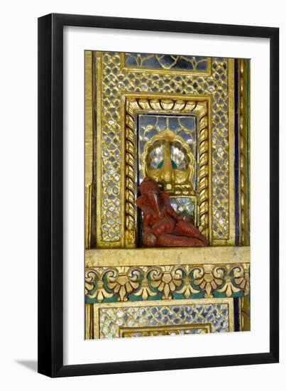 Hinduism: Small Reclining Ganesha (Elephant-Headed Deity) Statue on Ornate Gilded and Mirrored Wall-null-Framed Photographic Print