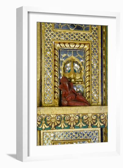 Hinduism: Small Reclining Ganesha (Elephant-Headed Deity) Statue on Ornate Gilded and Mirrored Wall-null-Framed Photographic Print