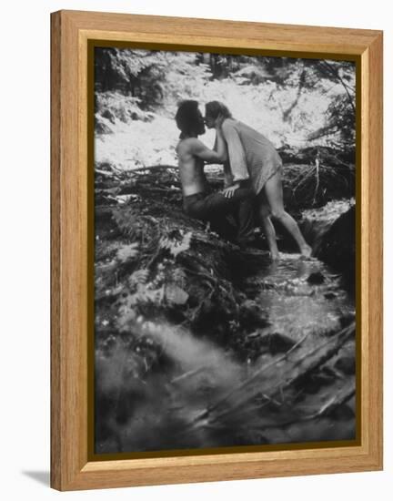 Hippie Couple Kissing at Woodstock Music Festival-Bill Eppridge-Framed Premier Image Canvas