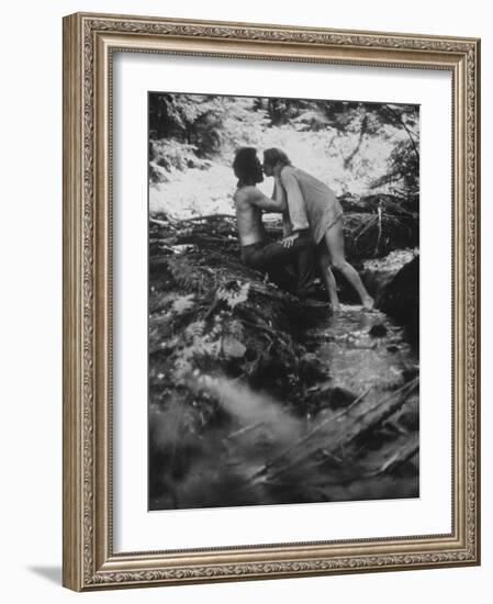 Hippie Couple Kissing at Woodstock Music Festival-Bill Eppridge-Framed Photographic Print