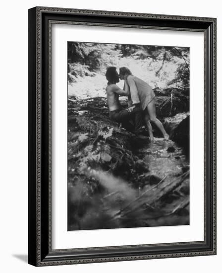 Hippie Couple Kissing at Woodstock Music Festival-Bill Eppridge-Framed Photographic Print