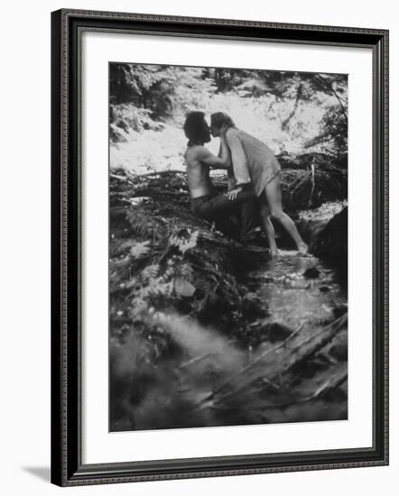 Hippie Couple Kissing at Woodstock Music Festival-Bill Eppridge-Framed Photographic Print