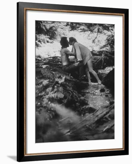 Hippie Couple Kissing at Woodstock Music Festival-Bill Eppridge-Framed Photographic Print