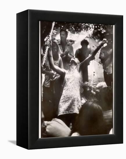 Hippie Girl Enthusiastically Playing Flute and Dancing at Woodstock Music Festival-null-Framed Premier Image Canvas