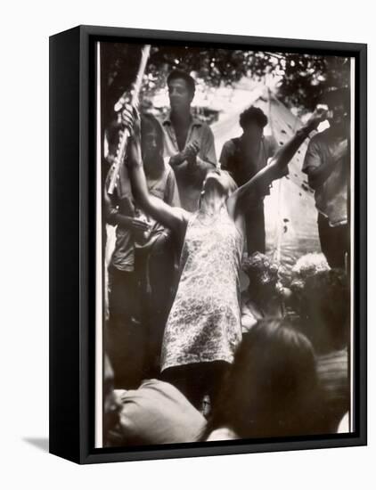 Hippie Girl Enthusiastically Playing Flute and Dancing at Woodstock Music Festival-null-Framed Premier Image Canvas