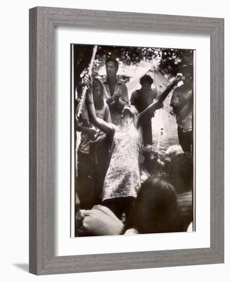 Hippie Girl Enthusiastically Playing Flute and Dancing at Woodstock Music Festival-null-Framed Photographic Print