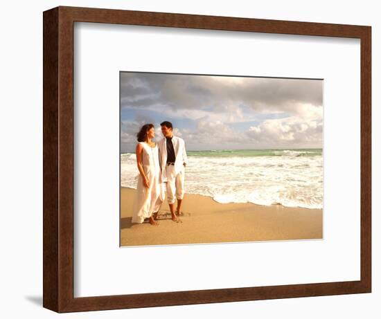 Hispanic Couple Walking Together on the Beach-Bill Bachmann-Framed Photographic Print