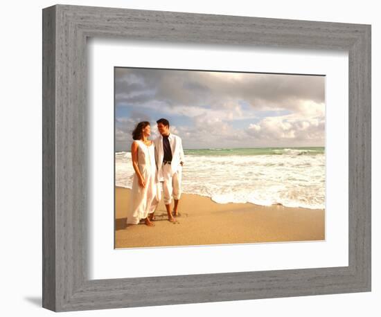 Hispanic Couple Walking Together on the Beach-Bill Bachmann-Framed Photographic Print