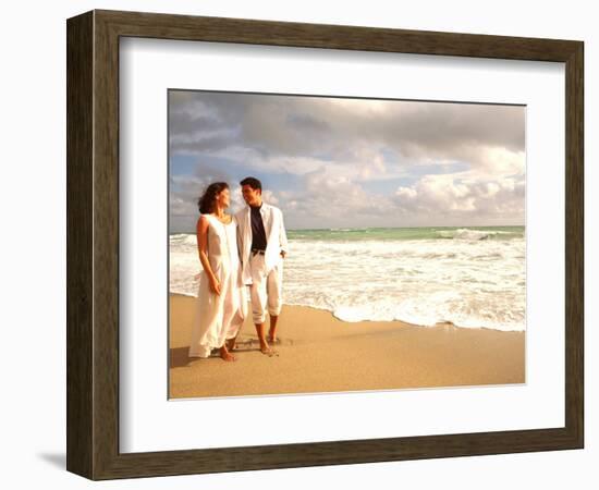 Hispanic Couple Walking Together on the Beach-Bill Bachmann-Framed Photographic Print