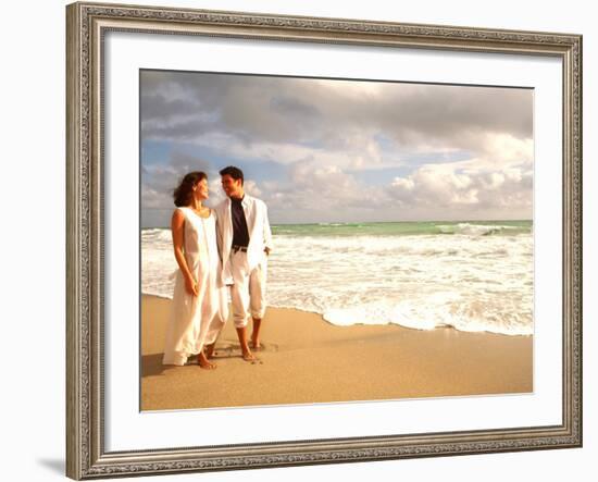 Hispanic Couple Walking Together on the Beach-Bill Bachmann-Framed Photographic Print