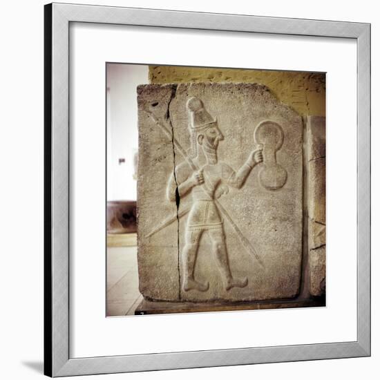 Hittite relef of a Hittite warrior or war-god with shield spear and sword. Artist: Unknown-Unknown-Framed Giclee Print