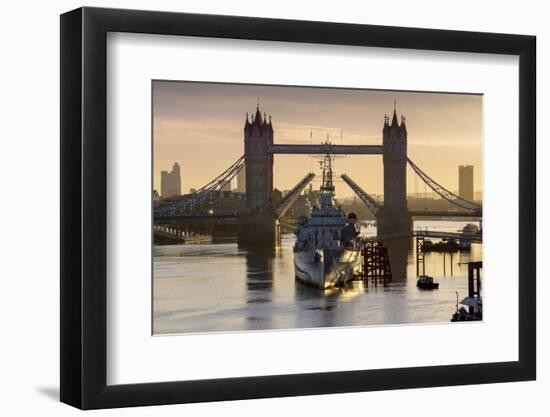 HMS Belfast is framed by Tower Bridge with deck raised, London-Charles Bowman-Framed Photographic Print