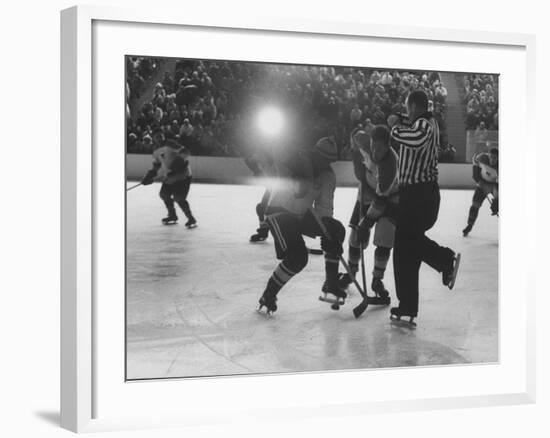 Hockey Game During Winter Olympics-null-Framed Premium Photographic Print