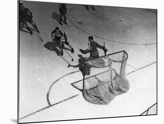 Hockey Great Jean Beliveau Taking a Shot on Net-Yale Joel-Mounted Premium Photographic Print