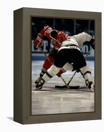 Hockey Players in Head to Head Competition-null-Framed Premier Image Canvas