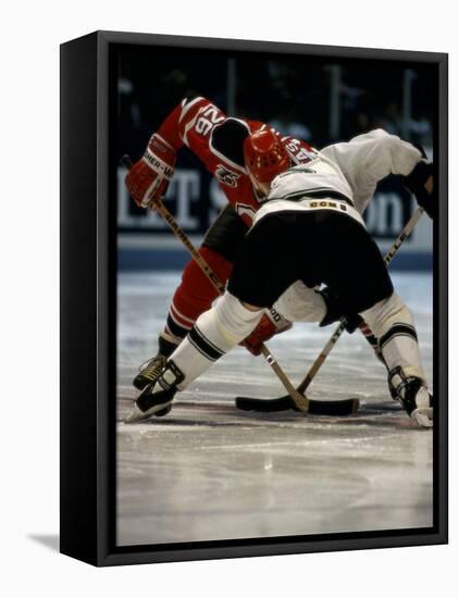 Hockey Players in Head to Head Competition-null-Framed Premier Image Canvas