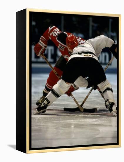 Hockey Players in Head to Head Competition-null-Framed Premier Image Canvas