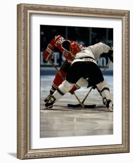 Hockey Players in Head to Head Competition-null-Framed Photographic Print