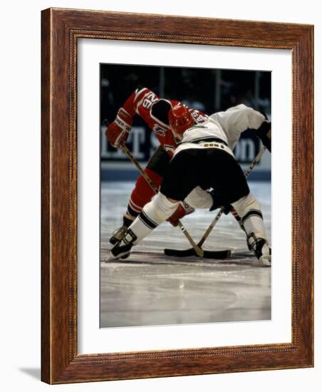 Hockey Players in Head to Head Competition-null-Framed Photographic Print