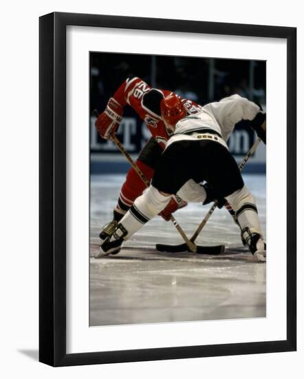 Hockey Players in Head to Head Competition-null-Framed Photographic Print