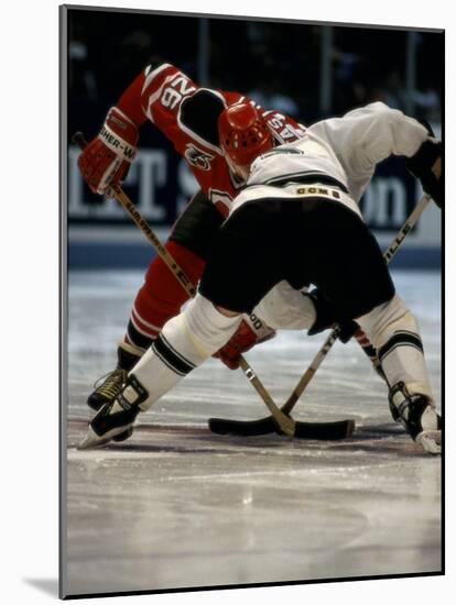 Hockey Players in Head to Head Competition-null-Mounted Photographic Print