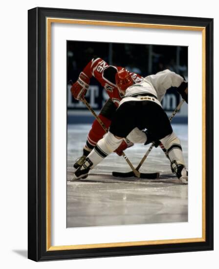 Hockey Players in Head to Head Competition-null-Framed Photographic Print