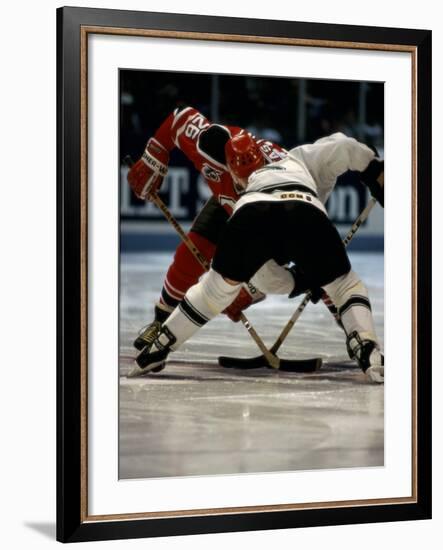 Hockey Players in Head to Head Competition-null-Framed Photographic Print