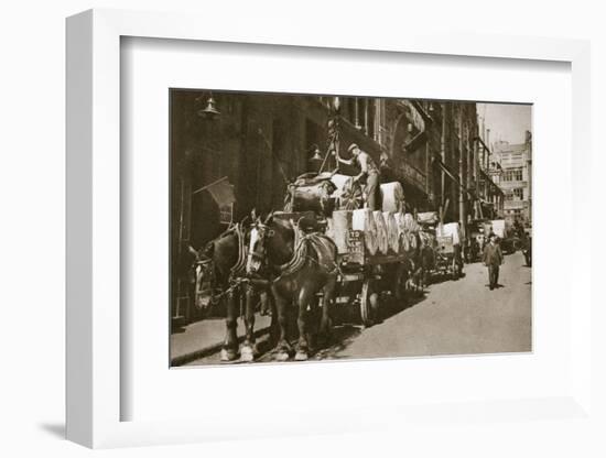 Hoisting the paper into a newspaper office, 20th century-Unknown-Framed Photographic Print