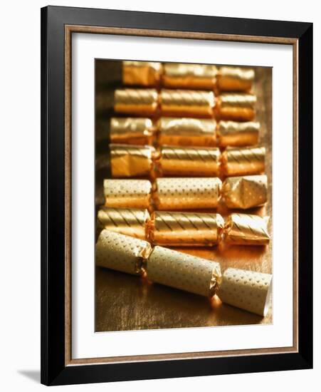 Holiday Candies Wrapped in Gold-null-Framed Photographic Print