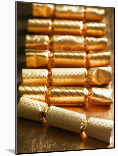 Holiday Candies Wrapped in Gold-null-Mounted Photographic Print