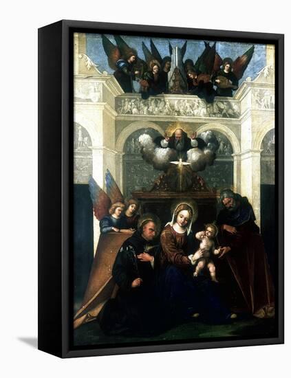 Holy Family with Saint Nicholas of Tolentino, 1515-1530-Lodovico Mazzolini-Framed Premier Image Canvas