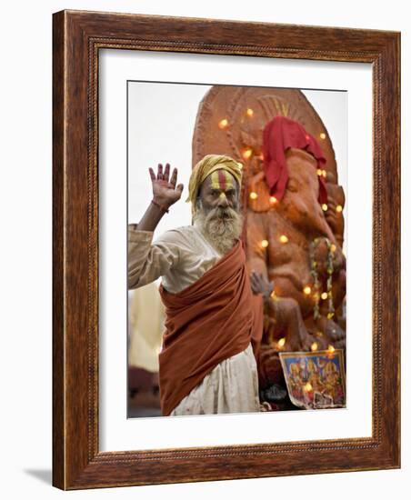 Holy Man in Front of a Ganesh Statue Draped in Fairy Lights at the Hindu Festival of Shivaratri-Don Smith-Framed Photographic Print